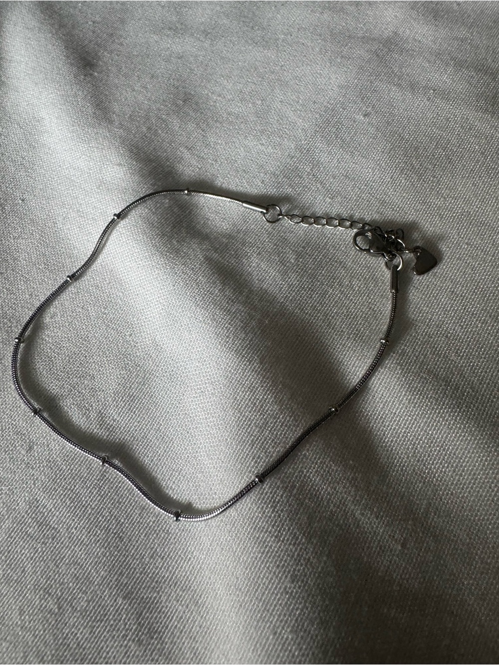 Silver-tone snake chain anklet with heart charm - 9"